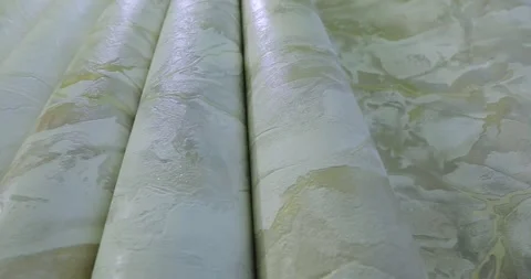 Wallpaper pattern close-up. Wallpaper rolls. Wallpaper at the exhibition close Stock Footage 294525399