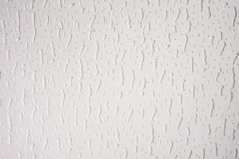 Wallpaper with pattern in the form of irregular and discontinuous vertical wo Stock Photos