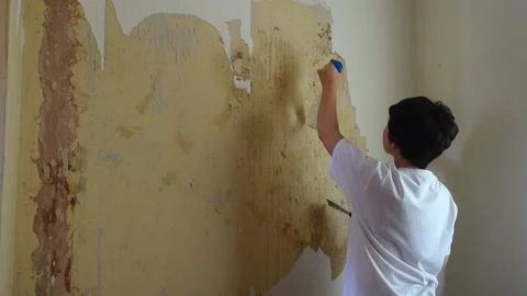 Wallpaper Scraping Stock Footage 130985410