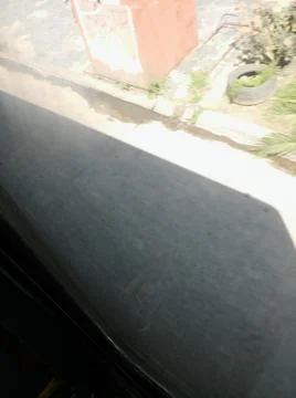 Wallpaper of a sidewalk with different city elements in daylight Fotos Stock