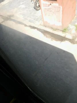 Wallpaper of a sidewalk with different city elements in daylight Fotos Stock