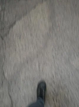 Wallpaper of a sidewalk with different city elements in daylight Stock Photos