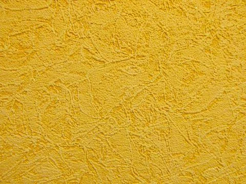 Wallpaper, yellow background on the wall. Stock Photos
