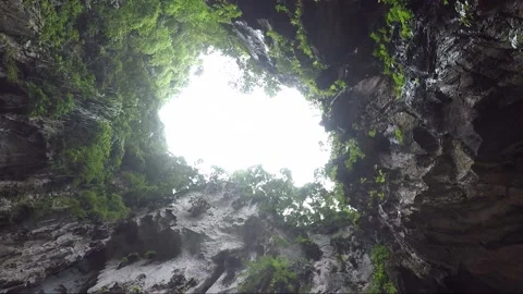 Walls and hole in ceiling inside Temple cave, Batu caves, Kuala Lumpur, Malaysia Stock Footage 197053978