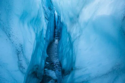 Walls of blue ice inside a deep crevasse on the Matanuska Glacier, Alaska. Stock Photos