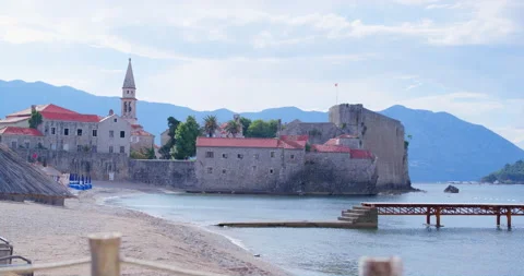 The walls of the old town of Budva on the background of the sea and mountains Stock Footage 201171616