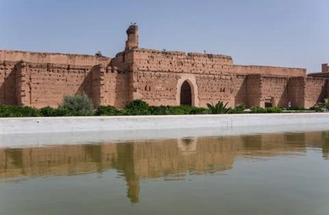 Wall's reflection in pool of El Badi Palace or Palais El Badii in Marrakech.. Stock Photos