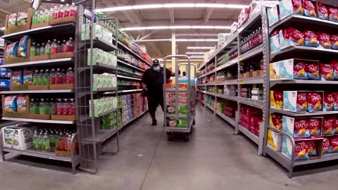 Walmart grocery retail store interior man working wearing a face mask Stock Footage 181381648