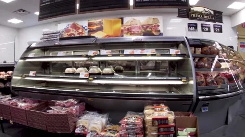 Walmart grocery retail store interior pan of deli prepared foods area Stock Footage 181383165
