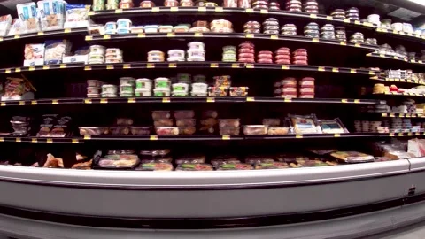 Walmart grocery retail store interior pan of dairy and deli sections Stock Footage 181383170