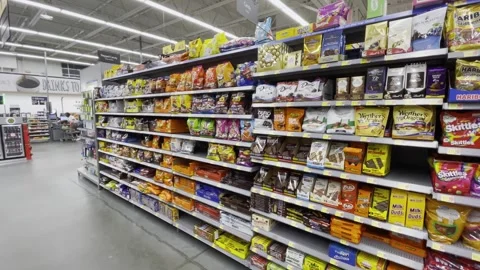 https://images.pond5.com/walmart-grocery-store-candy-section-footage-256603145_iconl.jpeg