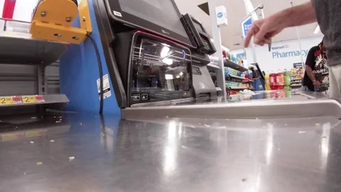 Walmart interior 2021 self checkout scanning card swipe Stock Footage 292722436