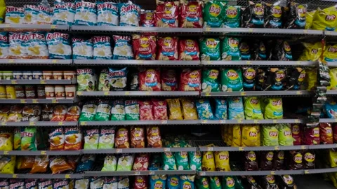 Walmart Retail grocery store interior bag potato chip aisle Stock Footage 202292011