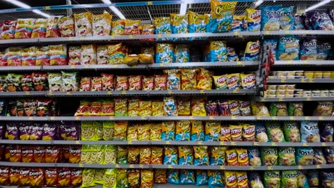 Walmart Retail grocery store interior Cheese curls and puffs Doritos bag pota Stock Footage 202292018