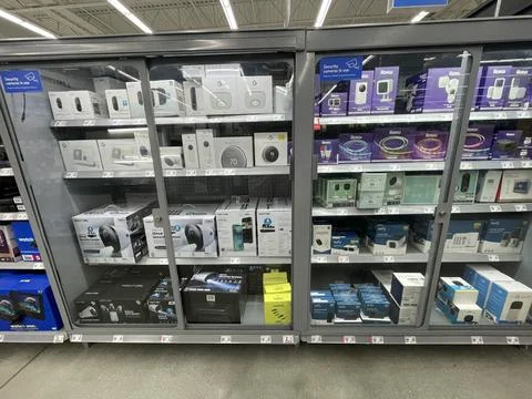 Walmart retail store 2025 electronics department security systems in locked.. Stock Photos