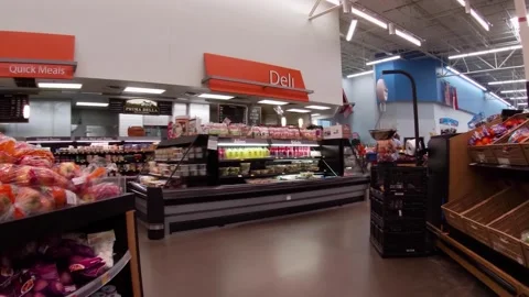 Walmart retail store interior with people covid-19 delta variant Deli Bakery  Stock Footage 157782185