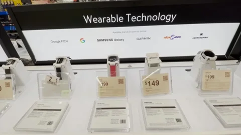 Walmart retail store Wearable technology display and prices Smart Watch Stock Footage 323550715