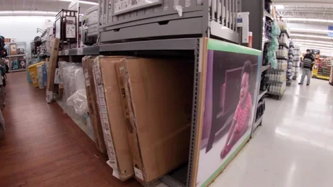 Walmart retail superstore interior back baby furniture section cluttered shel Stock Footage 158331260