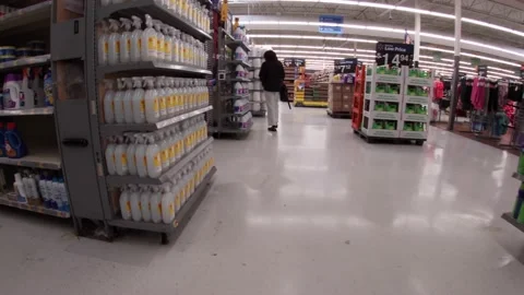 Walmart retail superstore interior cleaning chemical aisle and customer walki Stock Footage 158331420