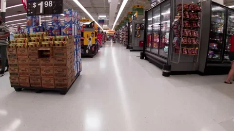 Walmart retail superstore interior main walkway and people Stock Footage 158410462