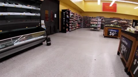 Walmart retail superstore interior meat area empty coolers  refrigeration is  Stock Footage 158408803