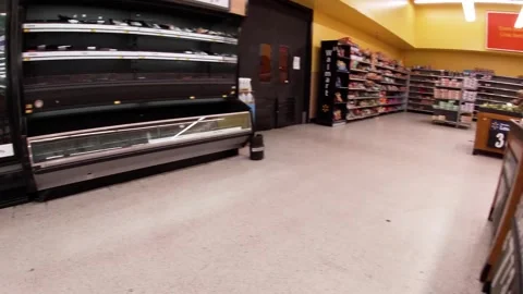 Walmart retail superstore interior meat area empty coolers pan produce depart Stock Footage 158408895