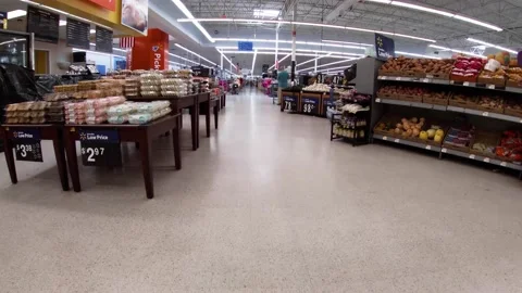 Walmart retail superstore interior people in deli and produce area Stock Footage 158409070