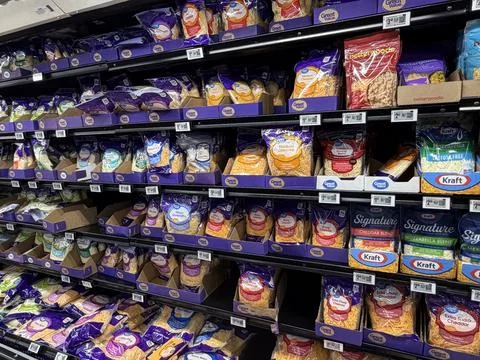 Walmart Shredded Cheese Section with Great Value and Kraft Prices 写真素材