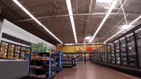 Walmart super center interior group of people wearing face masks Stock Footage 157615102