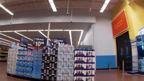 Walmart super center interior pan in to the dairy section and a customer Stock Footage 157615080