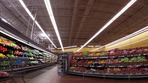 Walmart super center interior Produce wet wall and customer shopping Stock Footage 157635984