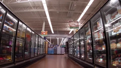 Walmart super center interior some customer on the frozen foods aisle Stock Footage 157615099