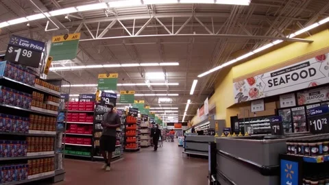 Walmart super center interior Workers and customers wearing face masks Stock Footage 157635978