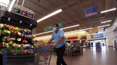 Walmart Supercenter retail store interior with people and  during the covid-1 Stock Footage 157793044