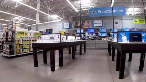 Walmart Supercenter retail store interior pan of electronics and people Stock Footage 165078015