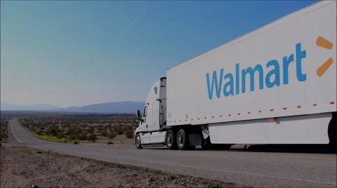 A Walmart truck on highway in Apple Valley ca Stock Footage