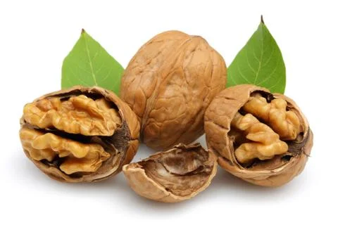 Walnut and cracked walnut with leaf isolated Stock Photos