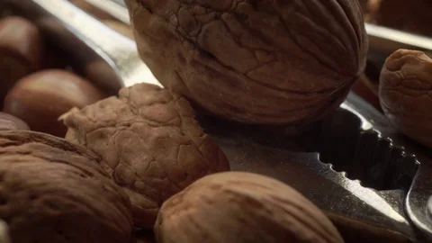 Walnut and nutcracker background scene 4K extreme close up stock footage Stock Footage 84534484