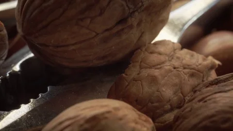 Walnut and nutcracker background scene 4K extreme close up stock footage Stock Footage 84535554