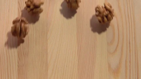 Walnut. Background of walnuts. Walnut kernels fall. Video stock 70879008