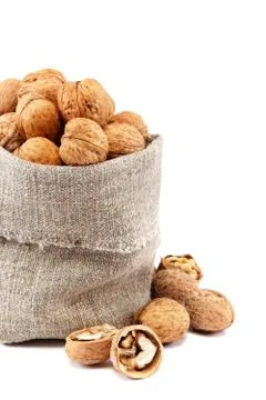 Walnut in a bag on a white background Stock Photos