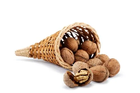 Walnut in a bag on a white background Stock Photos