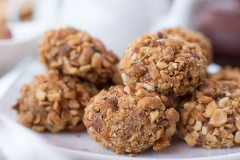 Walnut balls close-up, ground nuts, a small depth of field Stock Photos