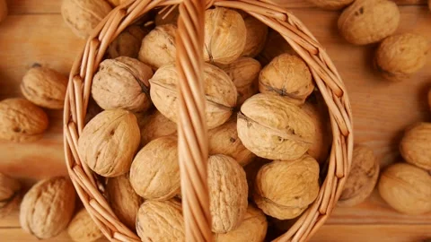Walnut in a basket, rotating. Stock Footage 238907383