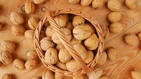 Walnut in a basket, rotating. Stock Footage 247956470