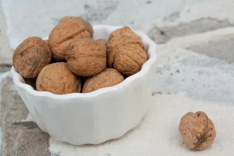 Walnut in a bowl Stock Photos