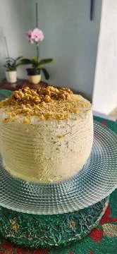 Walnut cake filled with dulce de leche. Stock Photos