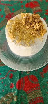 Walnut cake filled with dulce de leche. Stock Photos