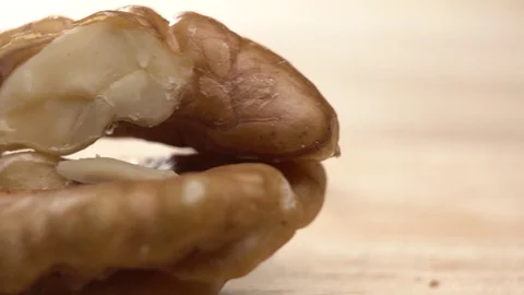 Walnut close up moving . product rich in minerals and vitamins. Walnut turns in Stock Footage 122995134