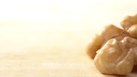 Walnut close up moving . product rich in minerals and vitamins. Walnut turns in Stock Footage 122995253